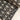 Housse de SofaCover  en coton imprimée à la main, motifs graphiques Lotus Noir. Finition passepoil élégante, déhoussable et lavable, idéale pour un intérieur éco-responsable et modulable.