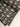 Housse de SofaCover  en coton imprimée à la main, motifs graphiques Lotus Noir. Finition passepoil élégante, déhoussable et lavable, idéale pour un intérieur éco-responsable et modulable.